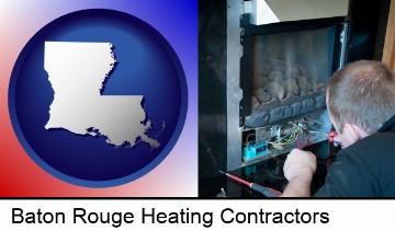 a heating contractor servicing a gas fireplace in Baton Rouge, LA