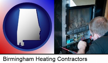 a heating contractor servicing a gas fireplace in Birmingham, AL