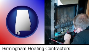 Birmingham, Alabama - a heating contractor servicing a gas fireplace