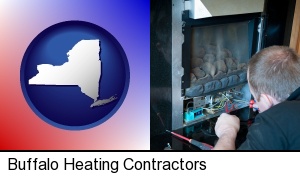 Buffalo, New York - a heating contractor servicing a gas fireplace