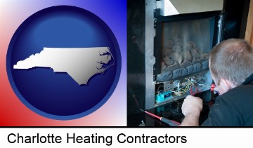 a heating contractor servicing a gas fireplace in Charlotte, NC