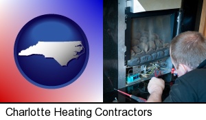 Charlotte, North Carolina - a heating contractor servicing a gas fireplace