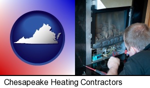 a heating contractor servicing a gas fireplace in Chesapeake, VA