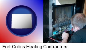 Fort Collins, Colorado - a heating contractor servicing a gas fireplace