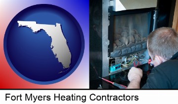 a heating contractor servicing a gas fireplace in Fort Myers, FL