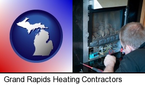 Grand Rapids, Michigan - a heating contractor servicing a gas fireplace