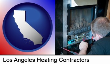 a heating contractor servicing a gas fireplace in Los Angeles, CA