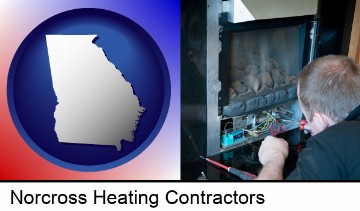 a heating contractor servicing a gas fireplace in Norcross, GA