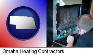a heating contractor servicing a gas fireplace in Omaha, NE