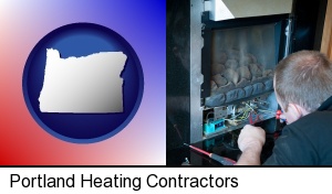 Portland, Oregon - a heating contractor servicing a gas fireplace