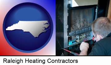 a heating contractor servicing a gas fireplace in Raleigh, NC