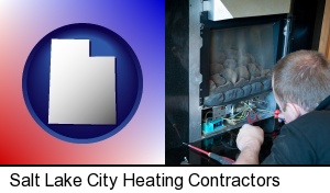 Salt Lake City, Utah - a heating contractor servicing a gas fireplace