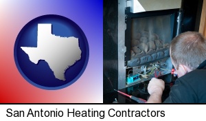 San Antonio, Texas - a heating contractor servicing a gas fireplace