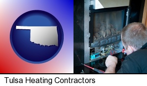 Tulsa, Oklahoma - a heating contractor servicing a gas fireplace
