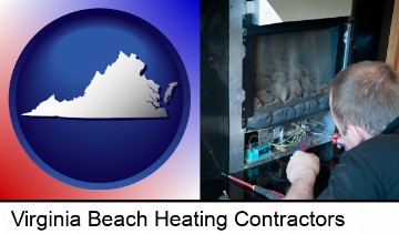 a heating contractor servicing a gas fireplace in Virginia Beach, VA