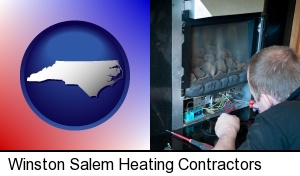 a heating contractor servicing a gas fireplace in Winston Salem, NC