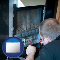 colorado map icon and a heating contractor servicing a gas fireplace