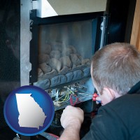 a heating contractor servicing a gas fireplace - with GA icon