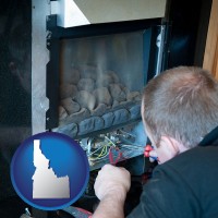 idaho map icon and a heating contractor servicing a gas fireplace