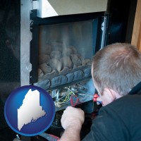 maine a heating contractor servicing a gas fireplace