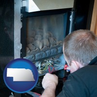 nebraska map icon and a heating contractor servicing a gas fireplace