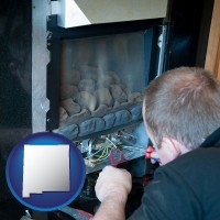 new-mexico a heating contractor servicing a gas fireplace