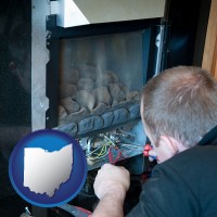 ohio a heating contractor servicing a gas fireplace