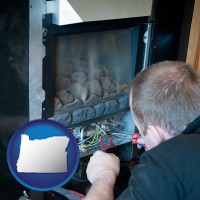 oregon a heating contractor servicing a gas fireplace