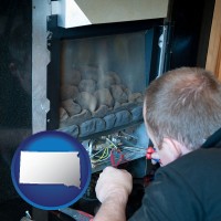 south-dakota map icon and a heating contractor servicing a gas fireplace