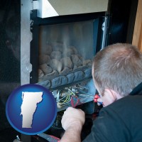 vermont map icon and a heating contractor servicing a gas fireplace