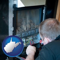 west-virginia a heating contractor servicing a gas fireplace