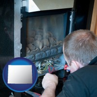 wyoming a heating contractor servicing a gas fireplace