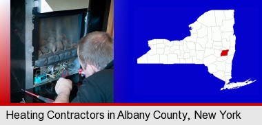 a heating contractor servicing a gas fireplace; Albany County highlighted in red on a map