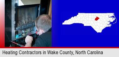 a heating contractor servicing a gas fireplace; Wake County highlighted in red on a map