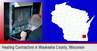 a heating contractor servicing a gas fireplace; Waukesha County highlighted in red on a map