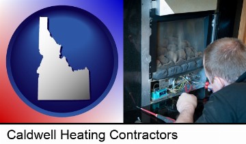 a heating contractor servicing a gas fireplace in Caldwell, ID