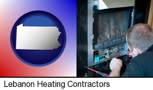 a heating contractor servicing a gas fireplace in Lebanon, PA
