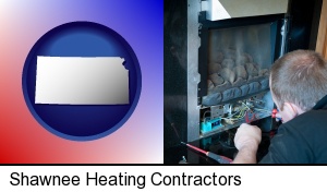 a heating contractor servicing a gas fireplace in Shawnee, KS