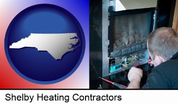 a heating contractor servicing a gas fireplace in Shelby, NC