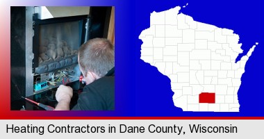 a heating contractor servicing a gas fireplace; Dane County highlighted in red on a map