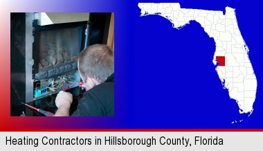 a heating contractor servicing a gas fireplace; Hillsborough County highlighted in red on a map